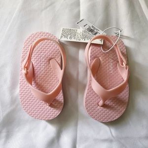 OLD NAVY light pink solid flip flops for babies